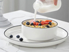 Ensemble de vaisselle minimaliste en porcelaine blanche en céramique à bords noirs